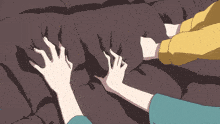 a person laying on a bed with their hands on a pillow