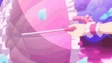 a girl in a pink dress is holding a pink umbrella in her hand