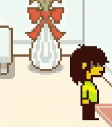 a pixel art of a girl standing next to a vase with a red bow on it .