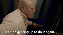 a bald man in a suit says " lance gearing up to do it again "