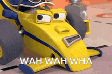 a yellow toy car with the words wah wah wha on the side