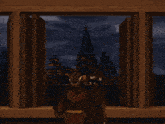 two men looking out a window at a castle