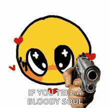 a person is pointing a gun at a yellow smiley face .
