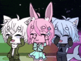 a boy and two girls are standing next to each other with their eyes closed
