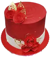 a red and white cake with red roses on top