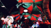 a group of people are standing under a red and green tent