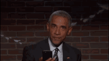 Obama Phone GIF - Obama Phone Drop GIFs