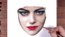 a drawing of a woman 's face with green eyes