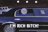 a picture of a limousine with the words i 'm rich bitch written on it