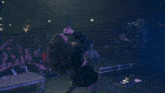 a woman laying on her back on a stage with a microphone in her hand