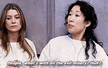 two women standing next to each other with the words " people what 's with all the evil misery huh " on the bottom