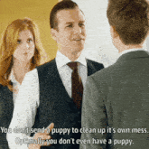 a man in a suit and tie is talking to another man in a suit and tie