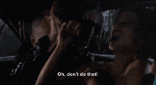 a woman in a car with the words oh don 't do that