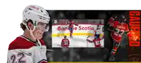 a hockey player with the name caufield on his back