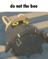 a cartoon character is laying on the floor with the words `` do not the boo '' written above it .