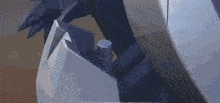 a close up of a robot 's arm with a metal cylinder in the middle of it .
