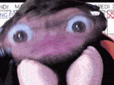 a close up of a person 's face with a calendar in the background that says redi on it