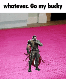 a toy soldier is standing on a pink carpet with the words whatever go my bucky above him