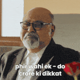 a bald man with glasses and a beard says phir wahi ek do crore ki dikkat