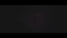 a purple background with a clock in the middle of the screen