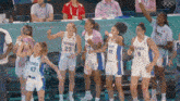 a group of female basketball players with france on their jerseys