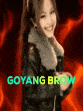 a picture of a woman with the words goyang brow written in green