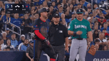 a baseball game between the mariners and the blue jays is being played