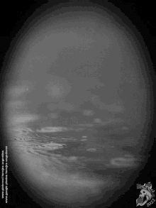 a black and white photo of a body of water with the year 2012 on the bottom