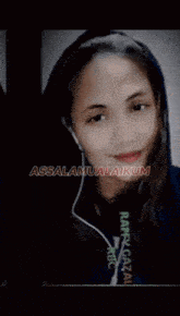 a blurry picture of a woman 's face is displayed on a black background .
