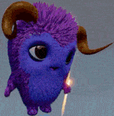 a blue and purple stuffed animal with horns is holding a stick