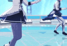 a couple of anime characters are dancing on a stage in a video game .