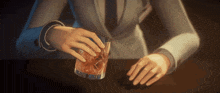 a man in a suit and tie is holding a glass of whiskey with ice cubes