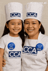 a woman and a little girl wearing chef hats and aprons for the cca center for culinary arts manila