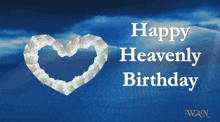 a happy heavenly birthday card with a heart made out of roses