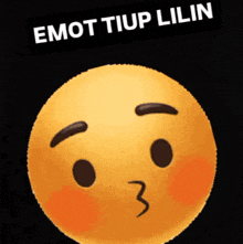 a yellow smiley face with a black sticker that says emot tiup lilin
