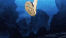 a person 's foot is flying through the air with a blue background