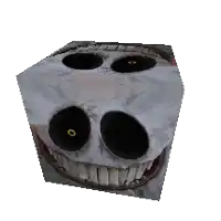 a cube with a skull face on it and a smiley face
