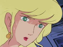 a woman with blonde hair and green eyes looks surprised