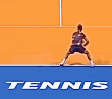 a tennis player is swinging a racket on a blue tennis court