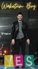 a man wearing a leather jacket stands in front of a sign that says yes