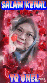 a woman wearing glasses and a hijab is surrounded by roses and says salam kenal to one