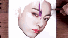 a person is drawing a face with purple hair
