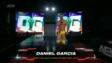a wrestler named daniel garcia is walking down a stage