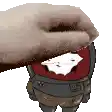 a hand is holding a piece of paper over a cartoon character 's head .