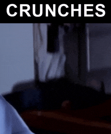 a blurry picture of a person with the words crunches on the top