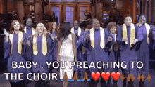 a group of people in choir uniforms are standing in a line and singing .