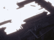 a shadow of a person is cast on a building