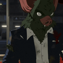 a man wearing a bat mask is eating a sandwich