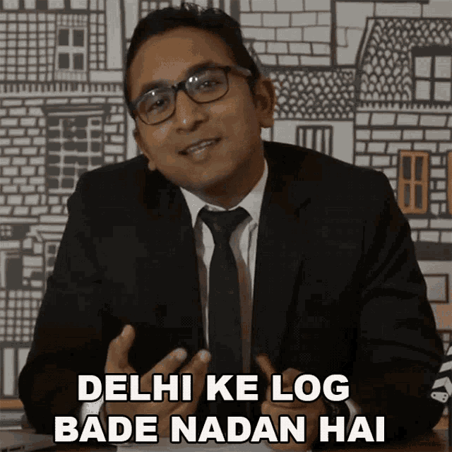 a man in a suit and tie is saying 