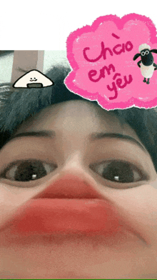 a girl making a face with a pink cloud that says chao em yeu